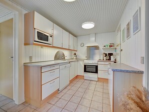 Fridge, microwave, dishwasher, cookware/dishes/utensils