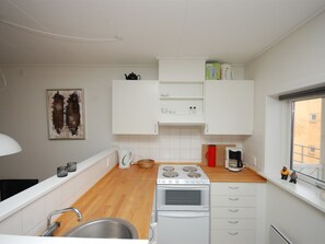 Fridge, oven, highchair, cookware/dishes/utensils