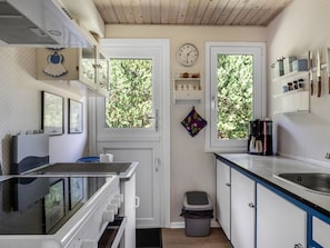 Fridge, microwave, cookware/dishes/utensils