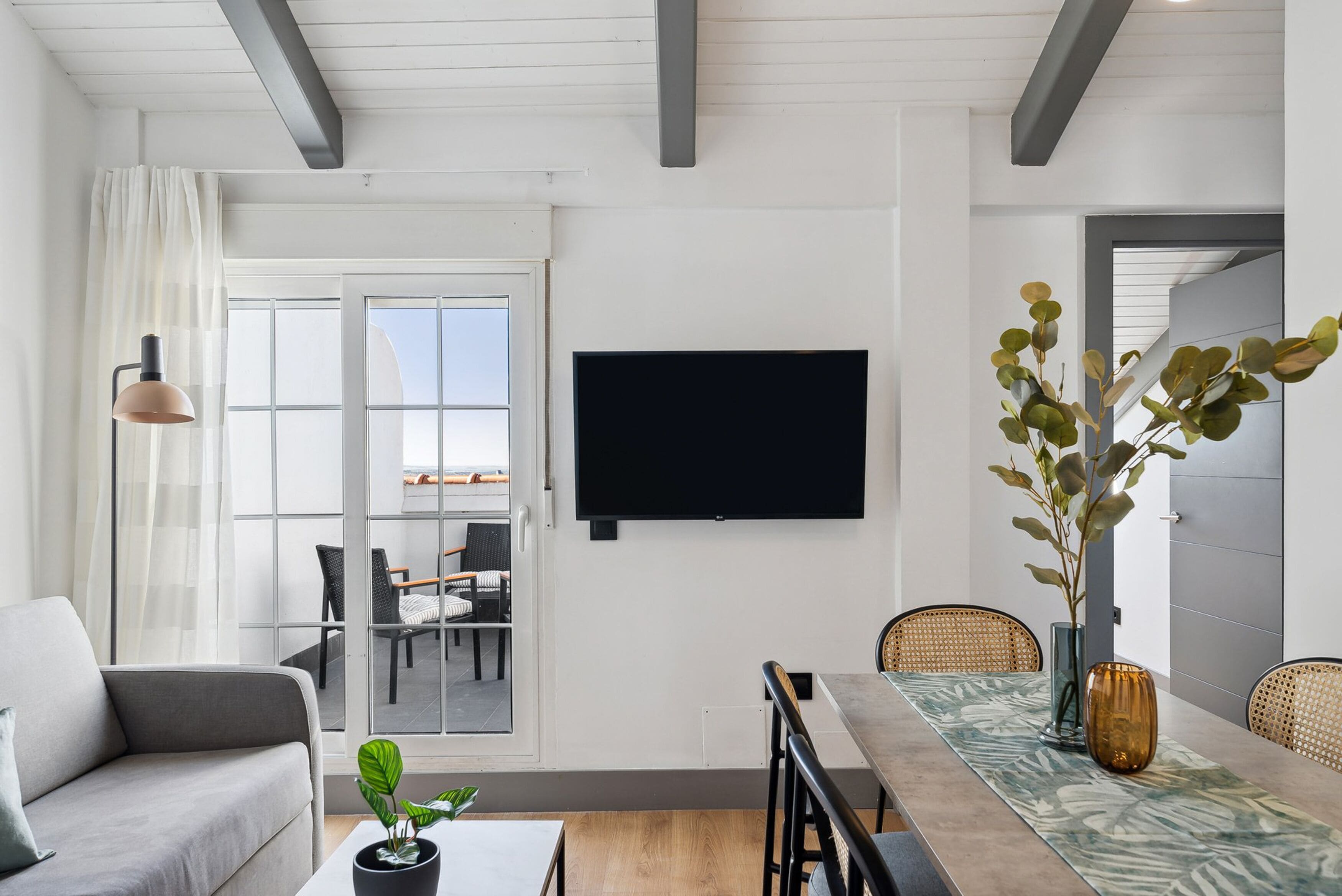 Televisión de pantalla plana de 50 pulgadas con canales por cable