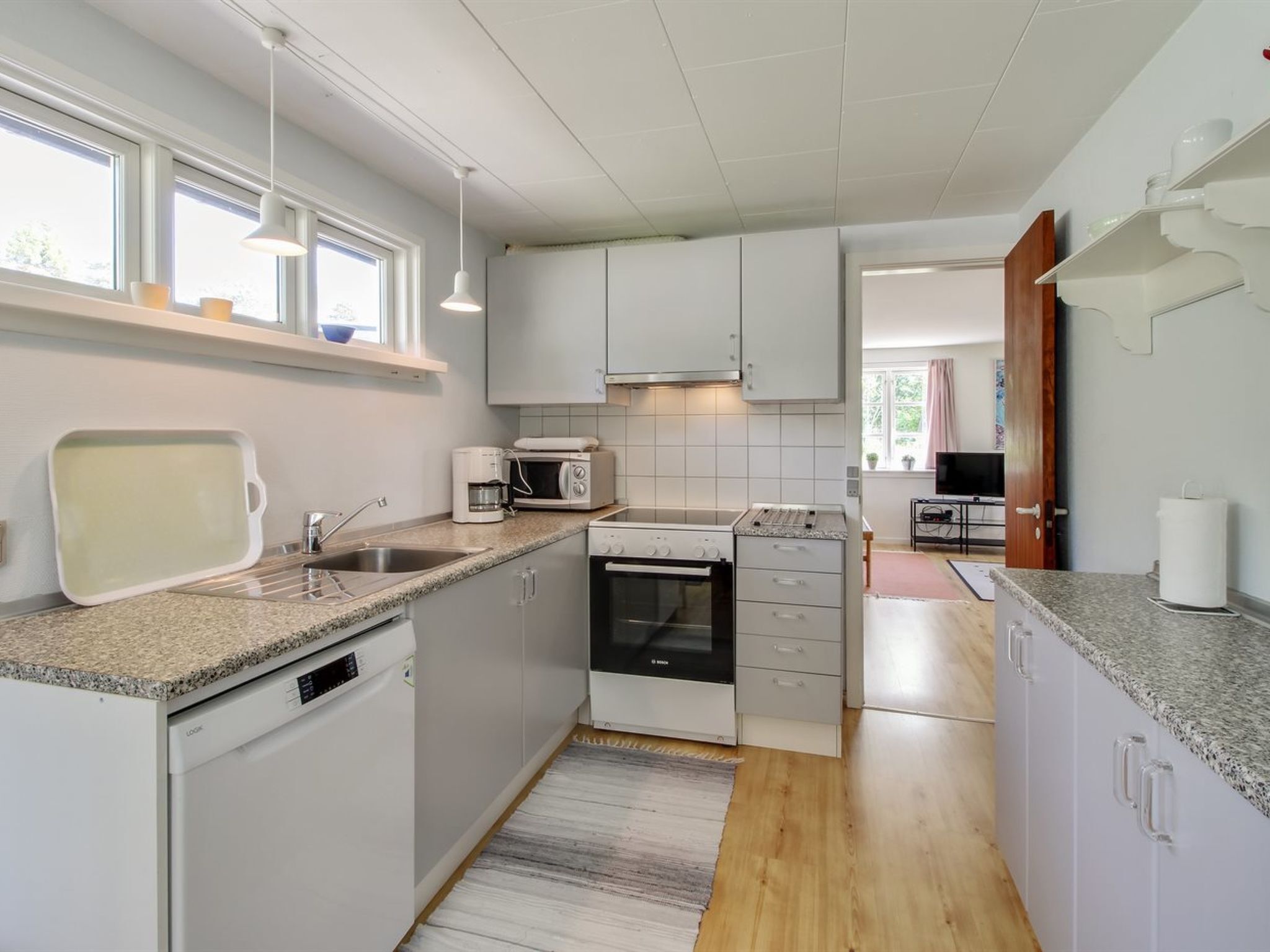 Fridge, microwave, dishwasher, cookware/dishes/utensils