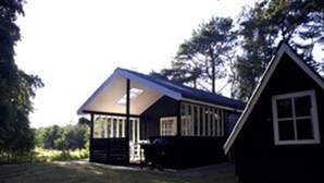 A two-story house with a sloped roof and a porch. - "Gaetana" - 1.6km from the sea by Interhome (Hals)