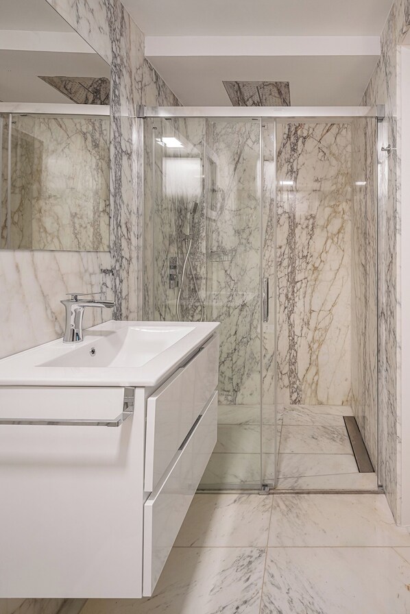 Shower, towels, soap, shampoo