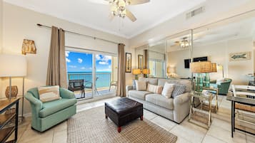 Signature Condo, 1 Bedroom, Non Smoking, Balcony | Living room | 55-inch flat-screen TV with cable channels