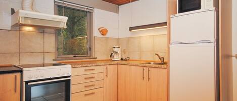 Fridge, microwave, cookware/dishes/utensils
