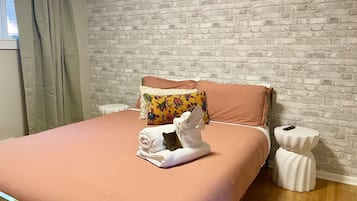 1 bedroom, desk, iron/ironing board, travel crib