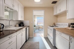 Fridge, microwave, oven, stovetop - Fremont Artful Escape | Walkable Garden Apartment (Seattle)