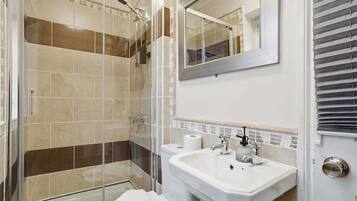 Shower, hair dryer, shampoo