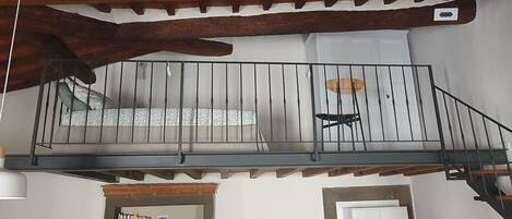 1 bedroom, desk, iron/ironing board, travel crib