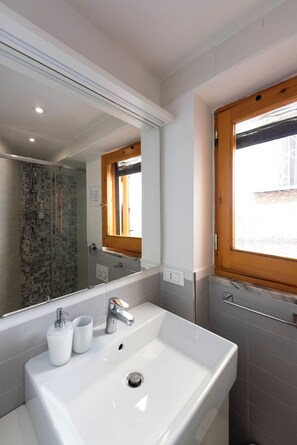 Hair dryer, bidet, towels, soap
