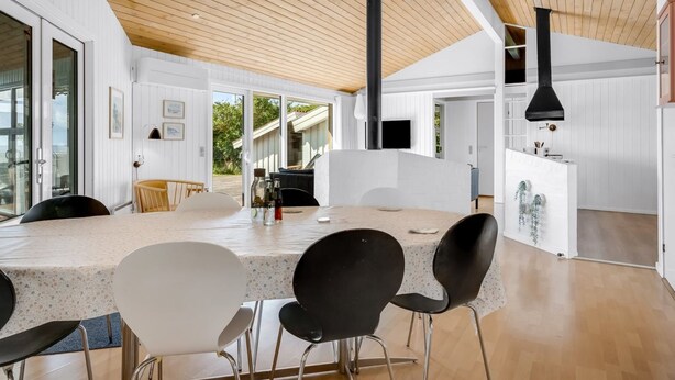 A spacious kitchen with a large island, modern appliances, and a view to the outdoors. - "Sulevi" - 200m to the fjord by Interhome (Vestervig)