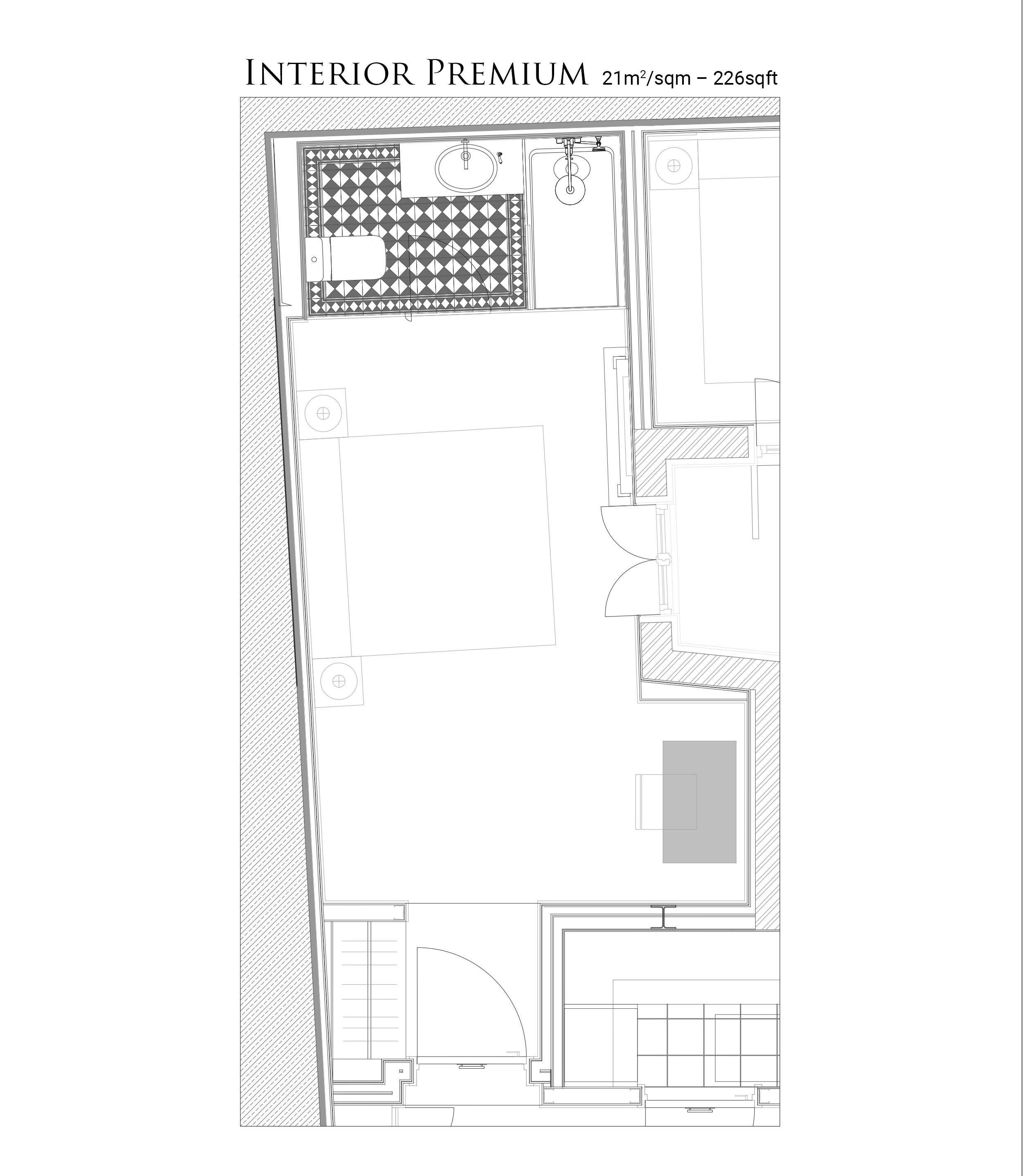 A floor plan of a hotel room with a bathroom, a kitchen area, and a seating space.