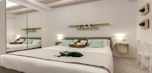 3 habitaciones, tabla de planchar con plancha, wifi y ropa de cama