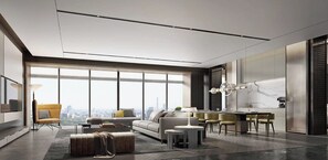 Een moderne woonkamer met uitzicht over de stad, een eethoek en een keuken.