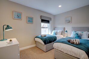 3 slaapkamers, een strijkplank/strijkijzer, reisbedje, gratis wifi