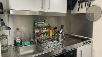 Apartment, 1 Queen Bed | Private kitchen | Fridge, microwave, oven, stovetop