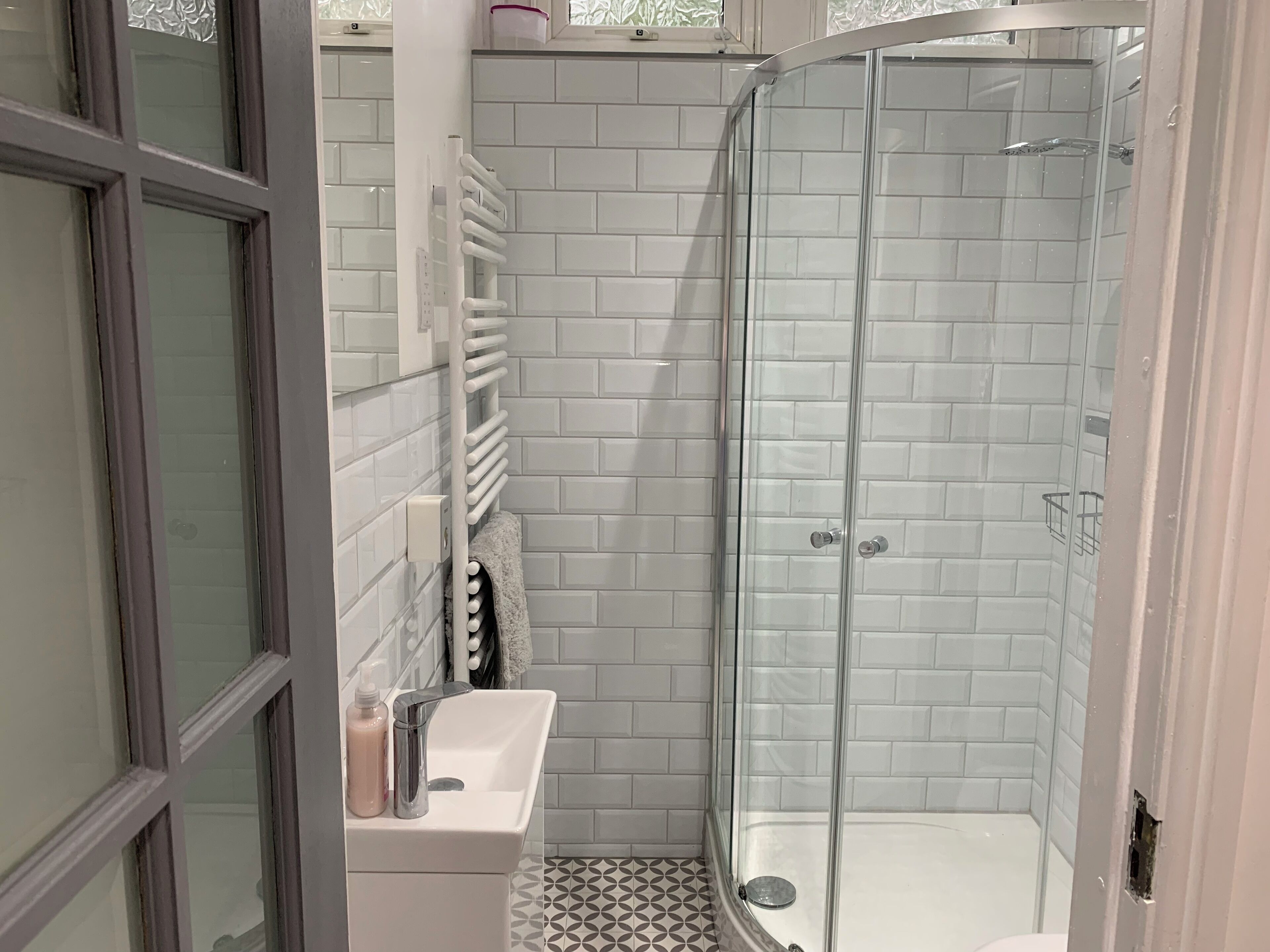 Apartment, 1 Queen Bed | Bathroom | Shower, hair dryer, towels