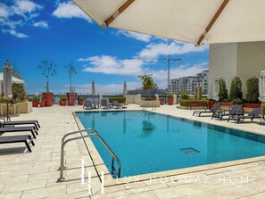 Outdoor pool, a heated pool - LUX  The La Mer Sea View Suite 3 (Dubai)