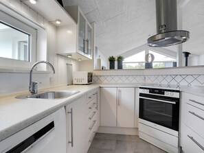 Fridge, microwave, dishwasher, cookware/dishes/utensils