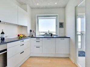 Fridge, microwave, dishwasher, cookware/dishes/utensils