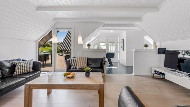 A modern loft apartment with a high ceiling, open-plan living area, and a dining space. - "Lidija" - 850m from the sea by Interhome (Ringkøbing)