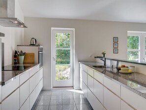 Fridge, microwave, dishwasher, cookware/dishes/utensils