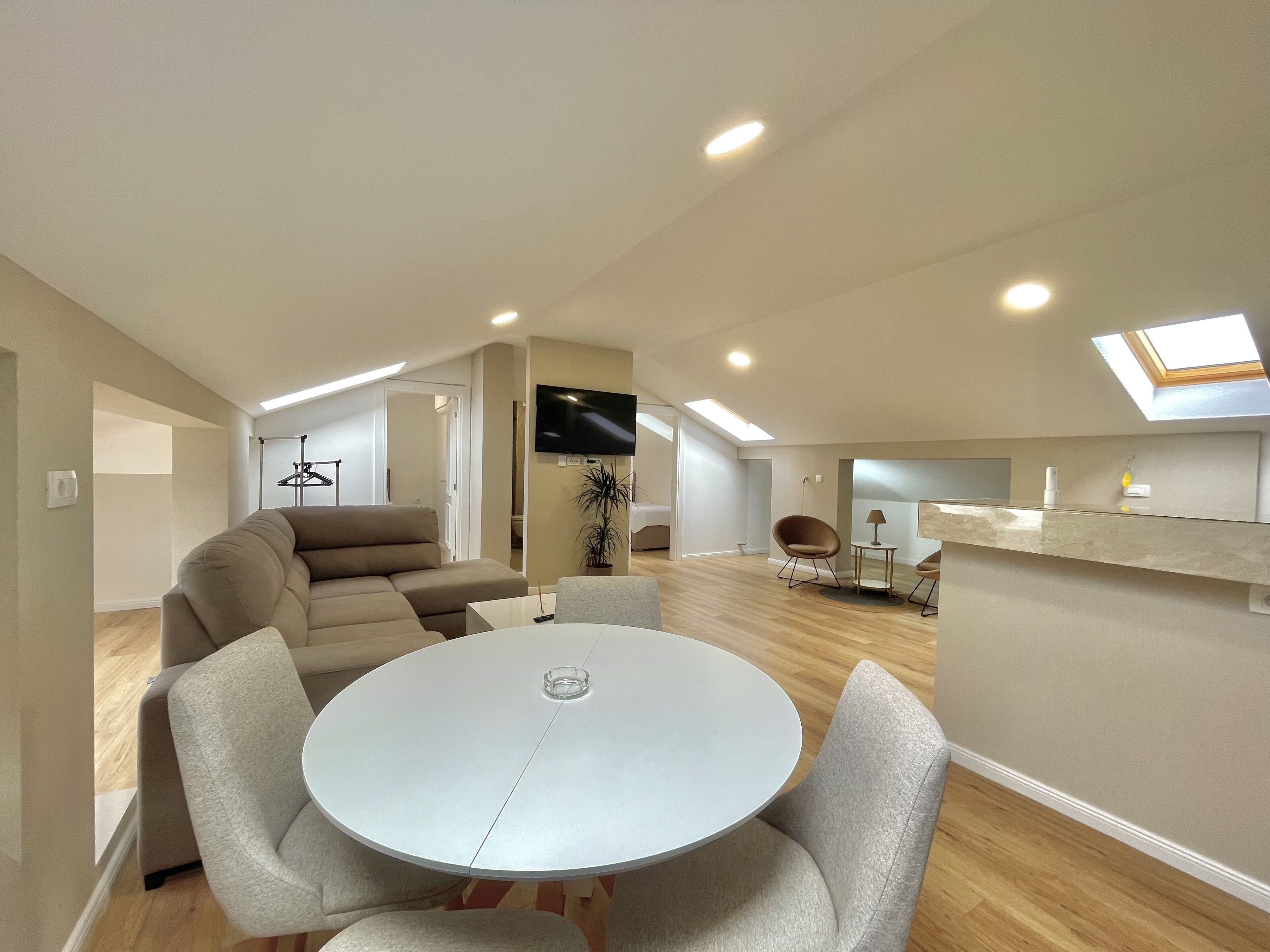 Family Apartment | Living area | 50-inch LCD TV with cable channels