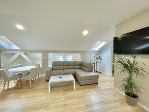 Family Apartment | Living area | 50-inch LCD TV with cable channels - Comfort Apartments Pasha  (Budva)