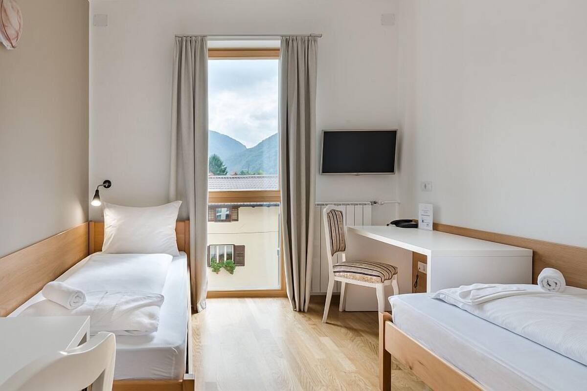 Standard Twin Room | Desk, laptop workspace, blackout drapes, iron/ironing board (on request)