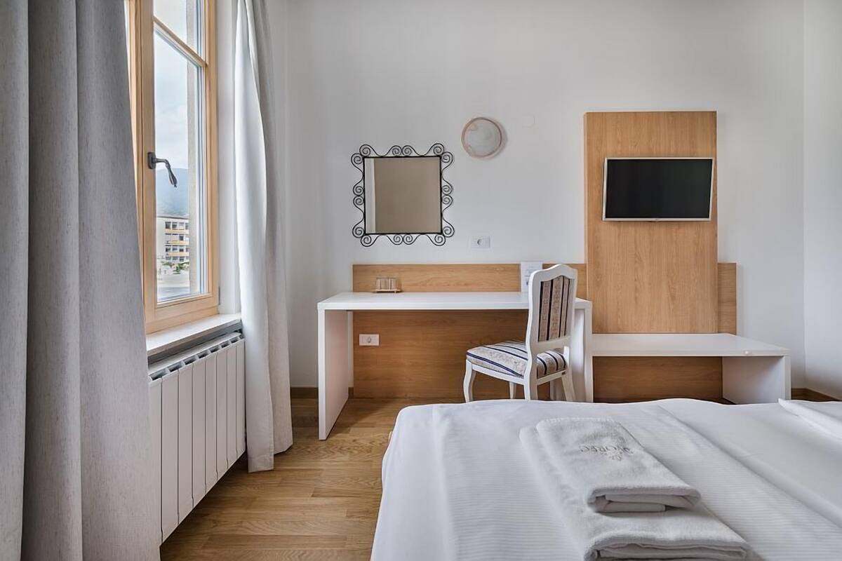 Standard Double Room | Desk, laptop workspace, blackout drapes, iron/ironing board (on request)