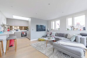 Basic Apartment, Multiple Beds | Living area | TV - Sleek & Spacious 2BD Flat - Clapham (London)