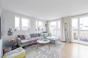 Basic Apartment, Multiple Beds | Living area | TV - Sleek & Spacious 2BD Flat - Clapham (London)