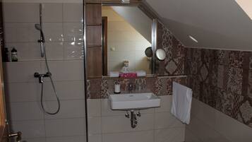 Shower, free toiletries, hair dryer, towels