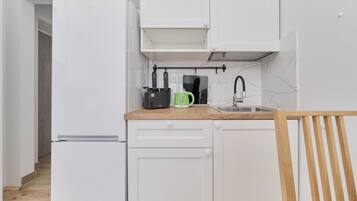 Microwave, stovetop, toaster, cookware/dishes/utensils