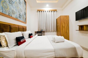 In-room safe, desk, laptop workspace, blackout curtains - Aceotel Inn Flamingo (Indore)