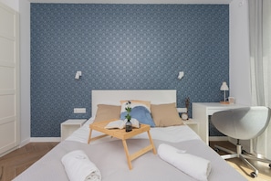 1 bedroom, desk, bed sheets