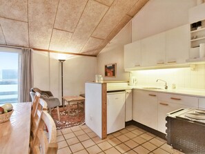 Fridge, highchair, cookware/dishes/utensils