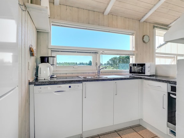Fridge, microwave, dishwasher, cookware/dishes/utensils