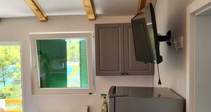New vacation home with 2 terraces, right by the sea - a dream surrounded by forest