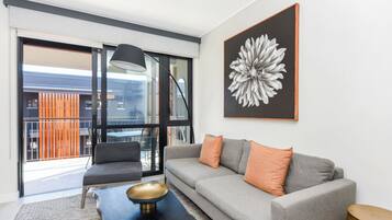 Classic Apartment | Living area | 50-inch flat-screen TV with cable channels, Netflix, streaming services