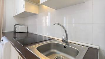 Fridge, microwave, coffee/tea maker, electric kettle