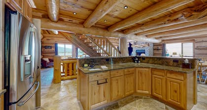 Lakefront cabin with game room, sauna, lake views, private beach, grill, deck