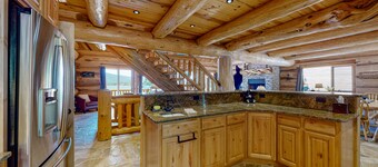 Lakefront cabin with game room, sauna, lake views, private beach, grill, deck