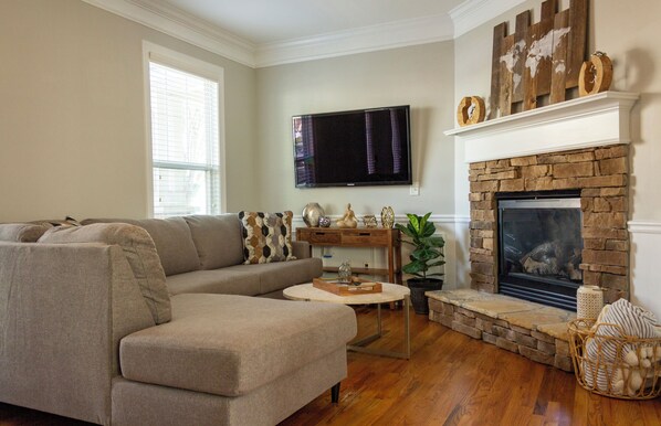 Smart TV, fireplace, books