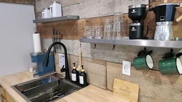 Fridge, stovetop, coffee/tea maker, electric kettle