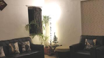 Apartment, Multiple Beds | Living area