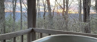 A Unique Bed and Breakfast...Log Cabins, with Hot Tubs and Breakfast Delivered Each Morning :)