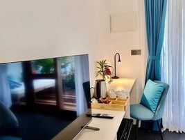 Vila luxo, 1 quarto, vista para o jardim | 1 quarto, roupas de cama antialérgicas, frigobar, cofres nos quartos