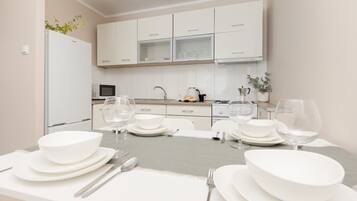 Apartment, 1 Bedroom, Balcony | Private kitchen | Microwave, cookware/dishes/utensils