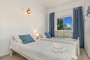 2 habitaciones, tabla de planchar con plancha, wifi y ropa de cama 